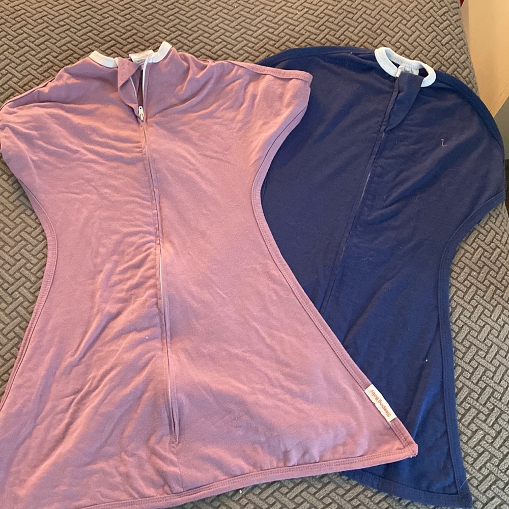 2 sleep sacks. Some pilling on the purple on. Good condition